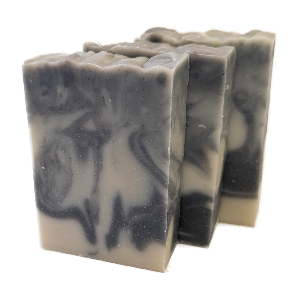 Three Big Blue Sky soap bars showing their indigo swirls