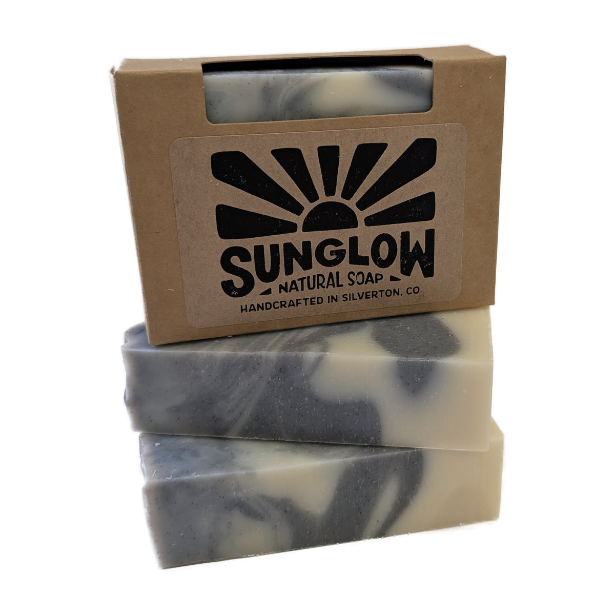 Big Blue Sky soap bars stacked with their kraft box