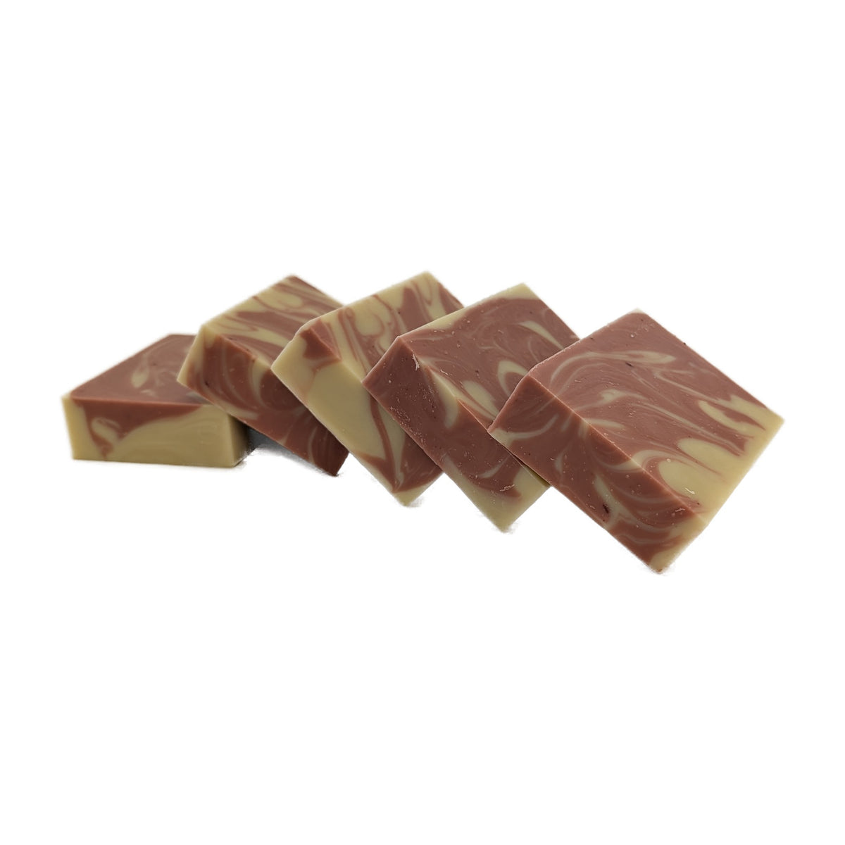A row of Alpenglow soap bars with rose clay swirls