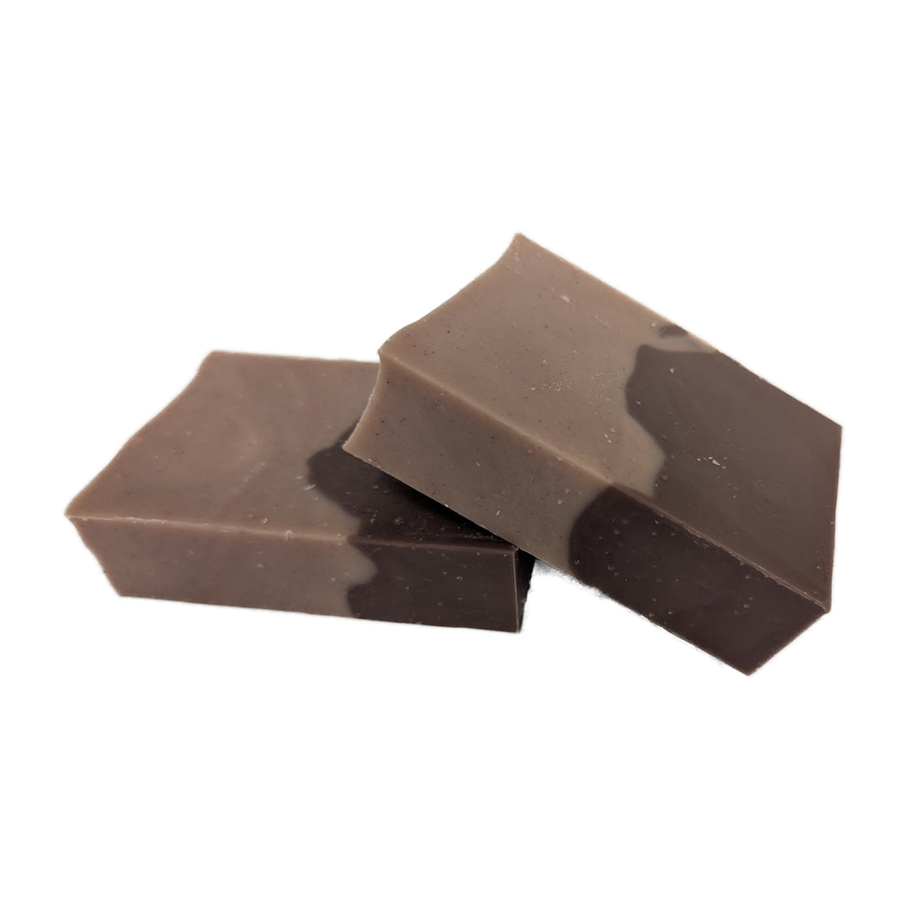 Two Mountain Majesty soap bars resting at an angle